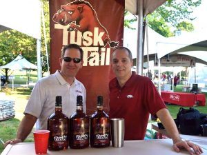 (from left) Craig May, the Godfather of Tusk to Tail, with Dale Cullins, the hardest working man in Tusk to Tail, set the bar during a 2015 game at Fayetteville.